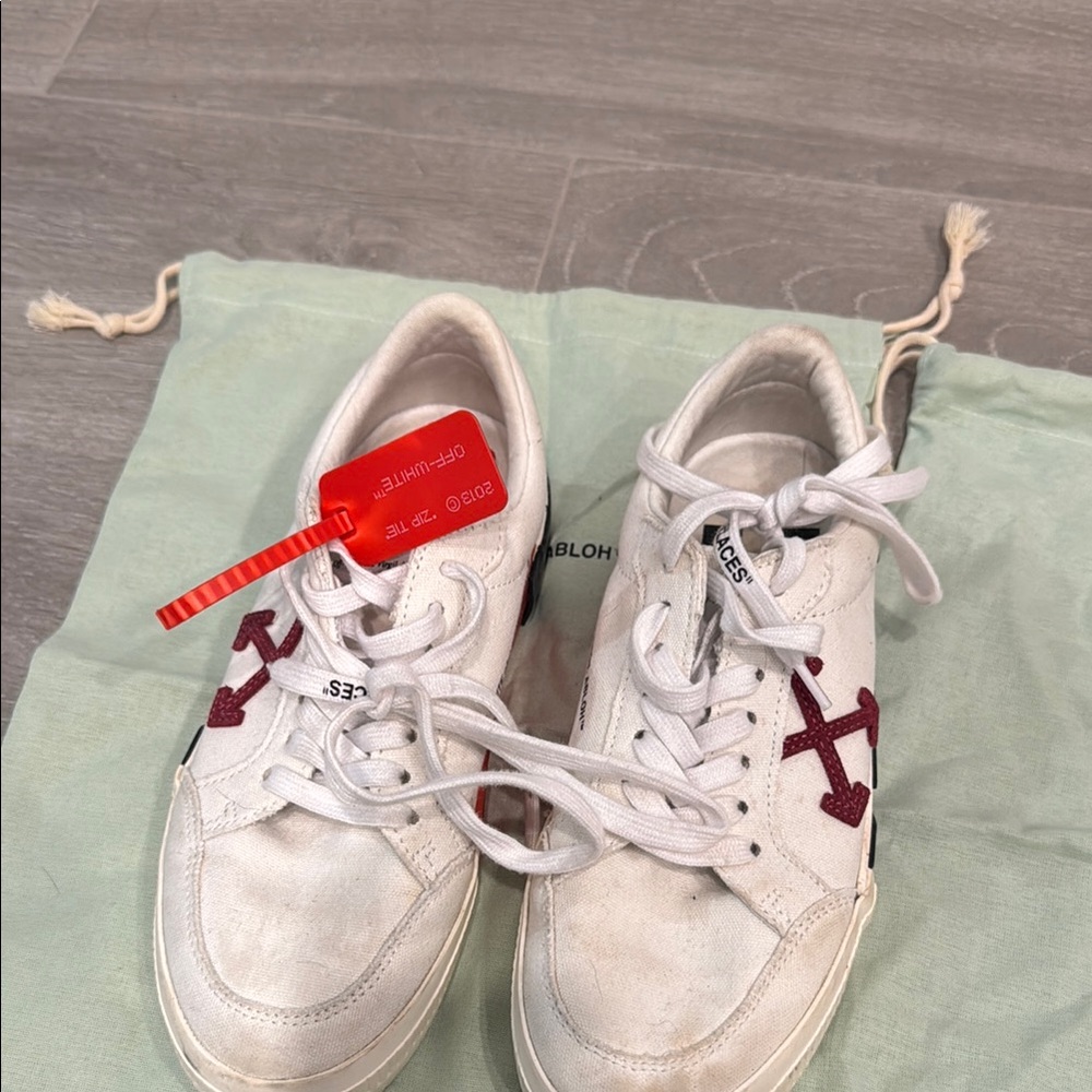 White Sneakers with Red Accents